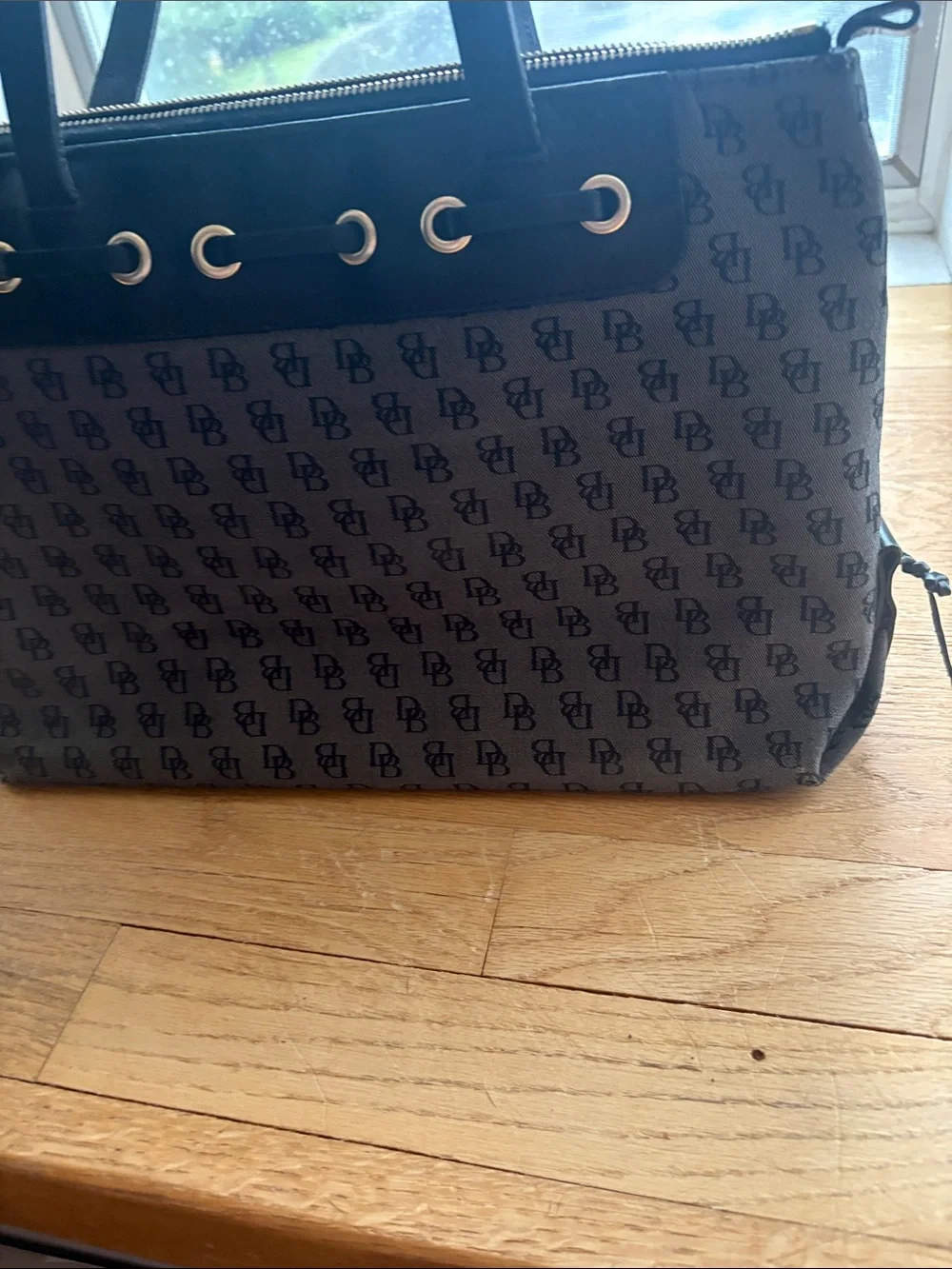 Dooney Black Patterned Tote Bag with Grommet Detail - woman’s